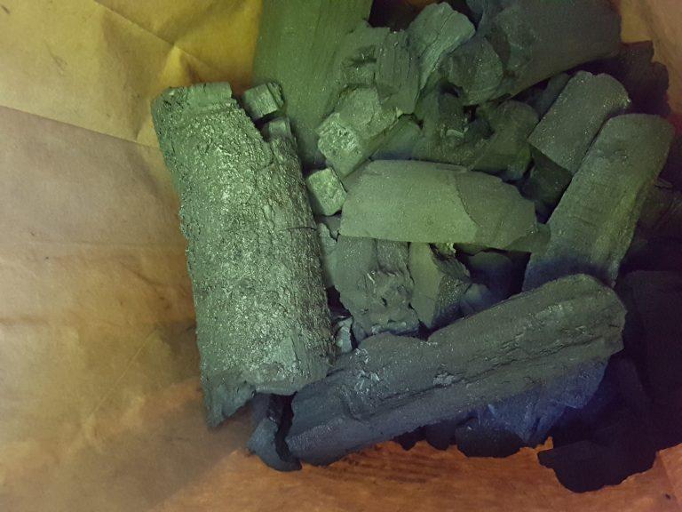 a fiew into one of our charcoal bags ready to seal for delivery