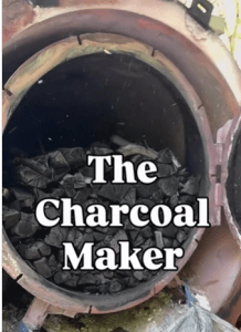 The charcoal maker - a view in to a charcoal retort with the title in front of the charcoal